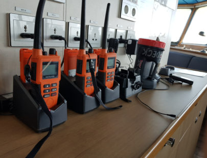 orange-walkie-talkies-on-chargers
