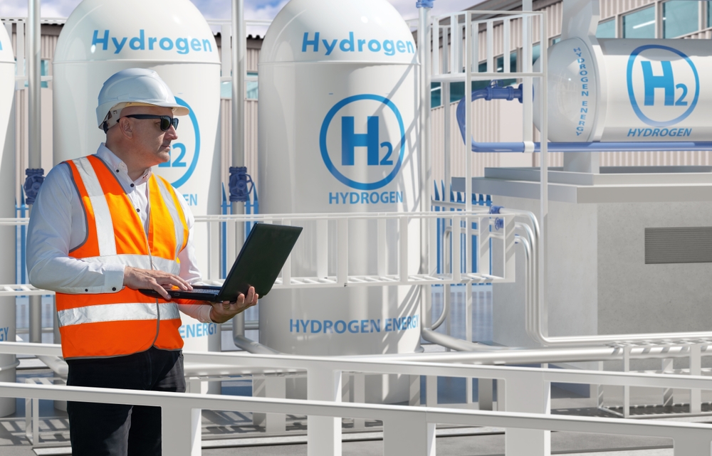 man-inspecting-hydrogen-tanks