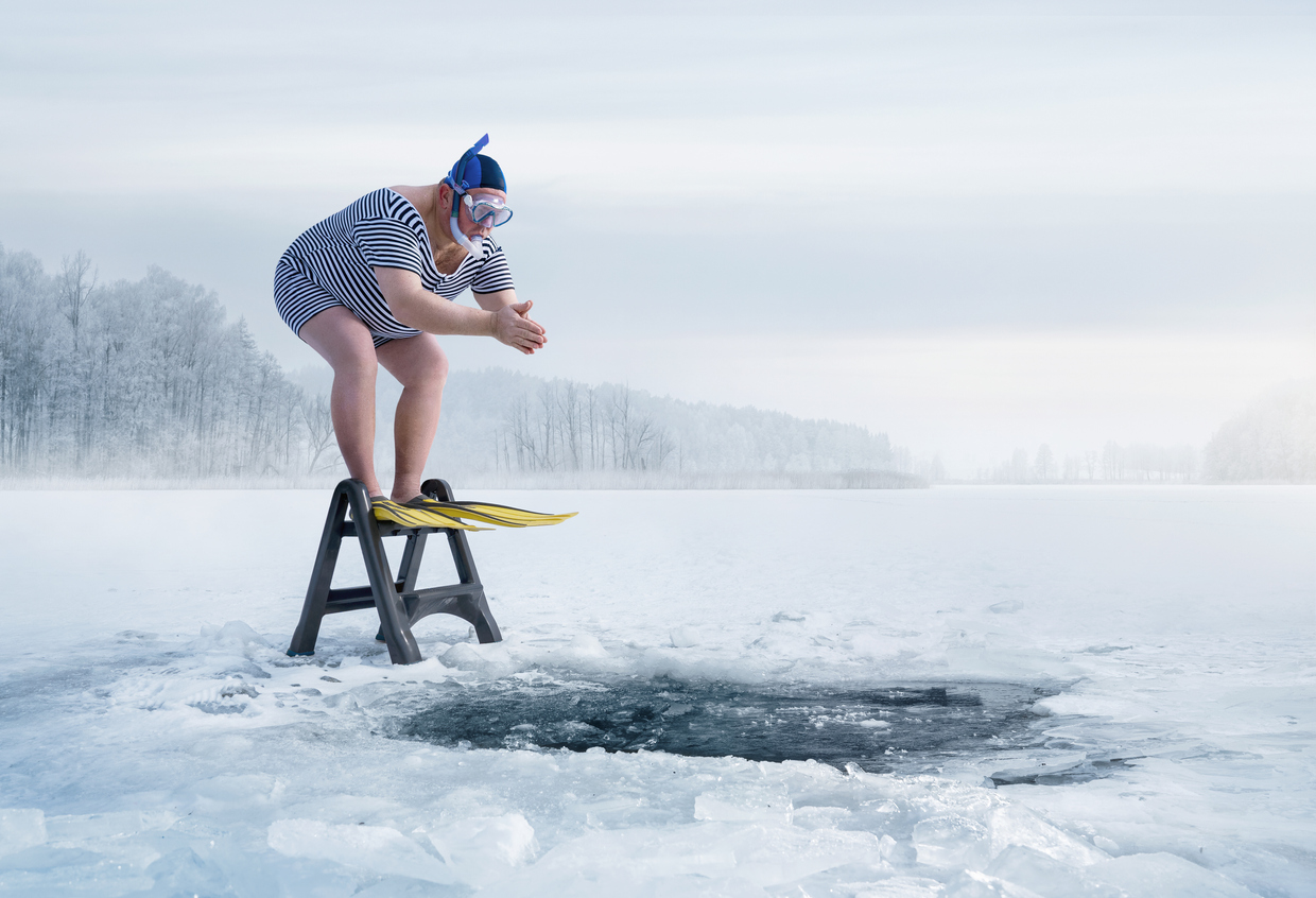 Man diving into icy water